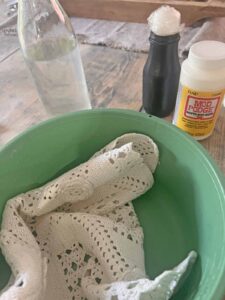 How to transform a thrifted Doily into Casper the friendly ghost for Halloween DIY bucket water mod podge prep