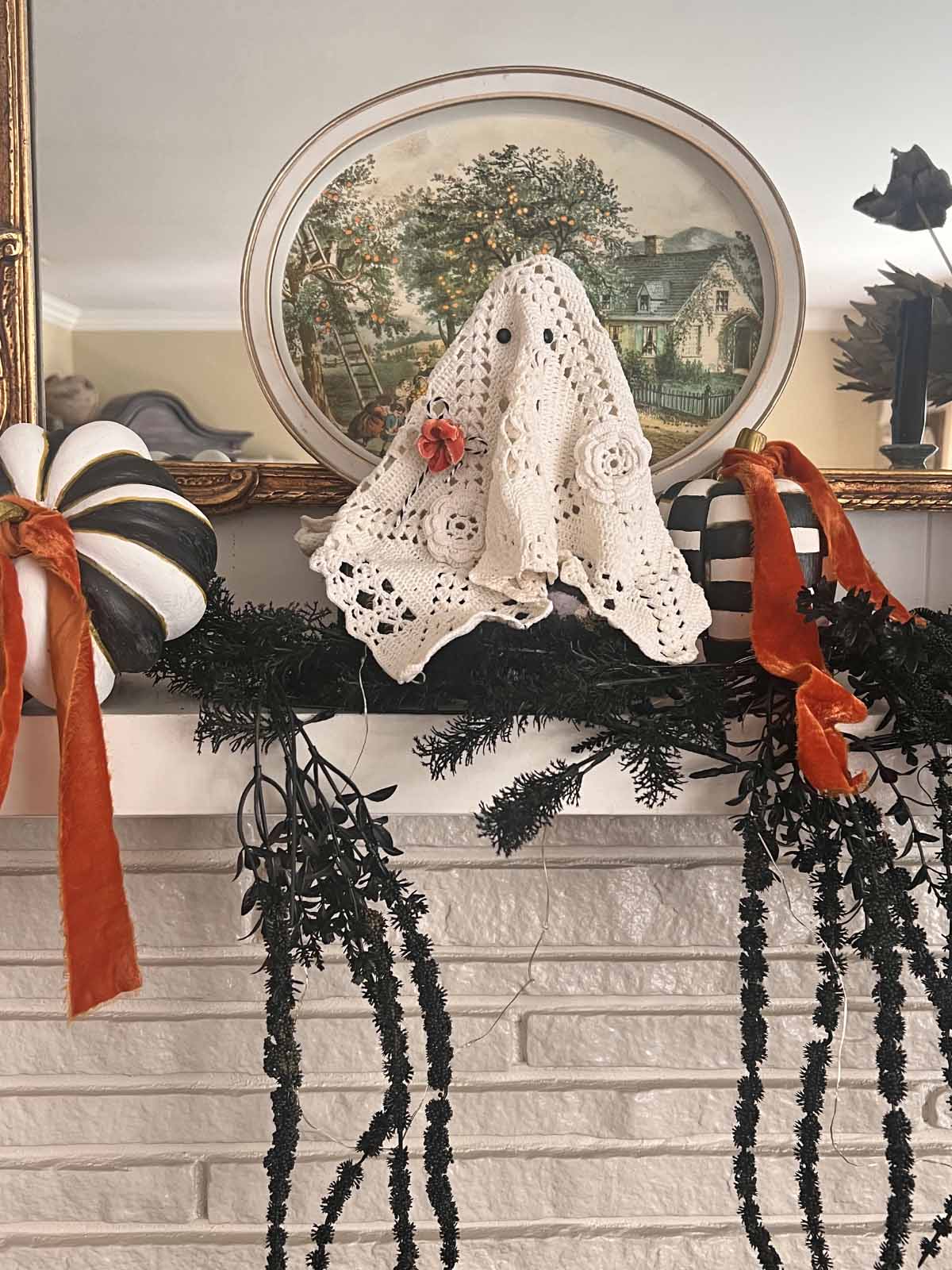 How to transform a thrifted Doily into Casper the friendly ghost for Halloween DIY styled with decorative tray, MacKenzie Childs pumpkin dupes and Anthro garland dupe